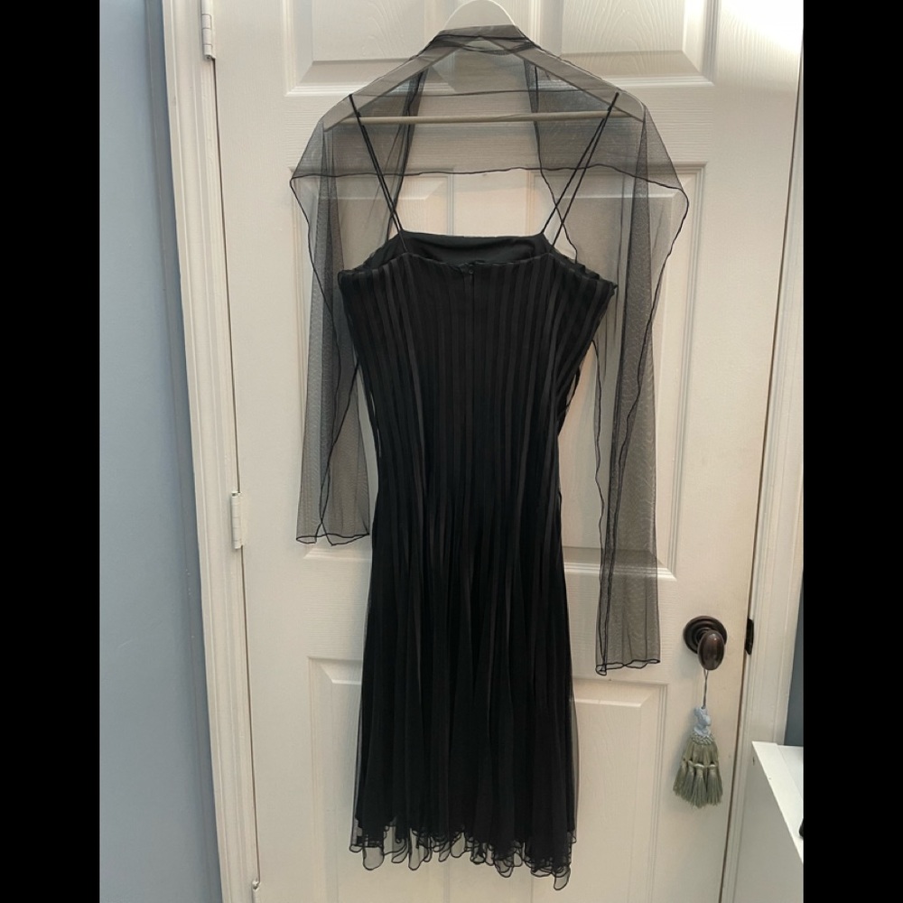 NWT black cocktail dress,  size 8 black with black lining dress sleeveless